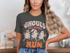 Dark grey t-shirt with "GHOULS JUST WANNA RUN" text and three cartoon ghosts.