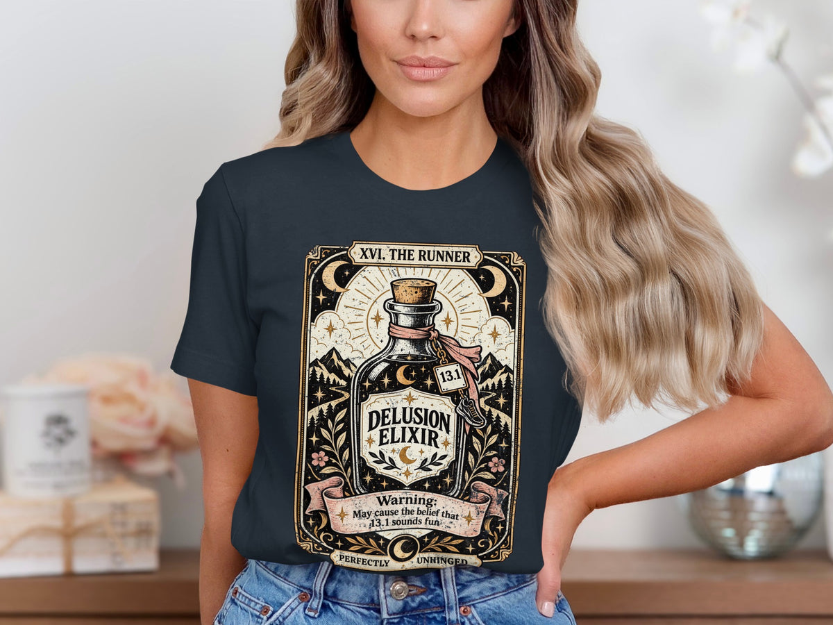 T-shirt graphic with "Delusion Elixir" bottle, stars, moon, mountains, and warning text.