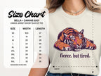 Size chart for Bella + Canvas 3001 unisex tee with tiger graphic and text "fierce. but tired."