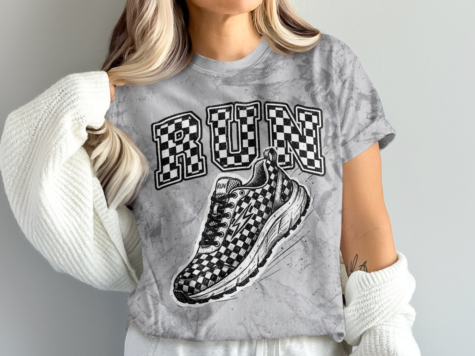 Gray tie-dye t-shirt with "RUN" and checkered shoe graphic.