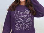 Purple sweatshirt with "I'm nicer after my run" text and running icons.