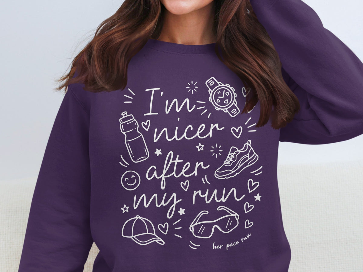 Purple sweatshirt with "I'm nicer after my run" text and running icons.
