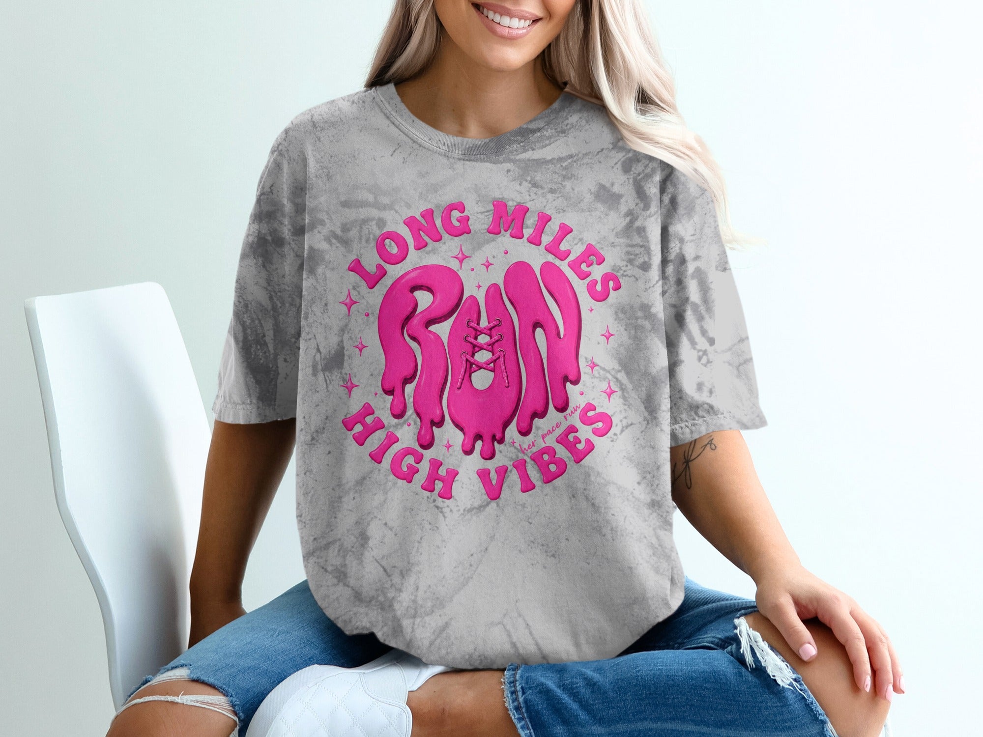 Grape tie-dye t-shirt with pink graphic text "LONG MILES RUN HIGH VIBES".