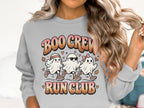 Three cartoon ghosts running with text "BOO CREW RUN CLUB" in retro font.