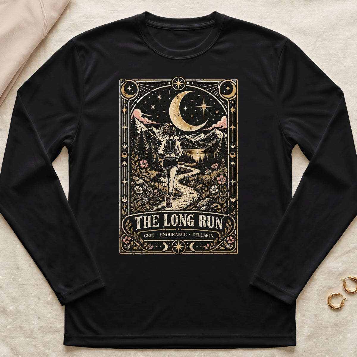 Black long-sleeve shirt with "The Long Run" graphic featuring a runner and celestial mountain landscape.