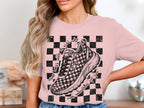 T-shirt with a checkered sneaker graphic and text about running.