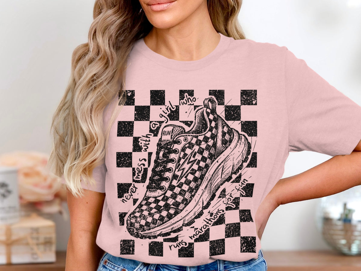 T-shirt with a checkered sneaker graphic and text about running.