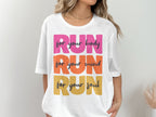 White t-shirt with "RUN for your body, mind, and soul" text.