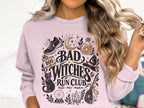 Graphic of "Bad Witches Run Club" with spooky and magical elements.