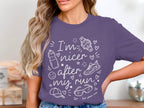 Purple t-shirt with white graphic "I'm nicer after my run" and running icons.