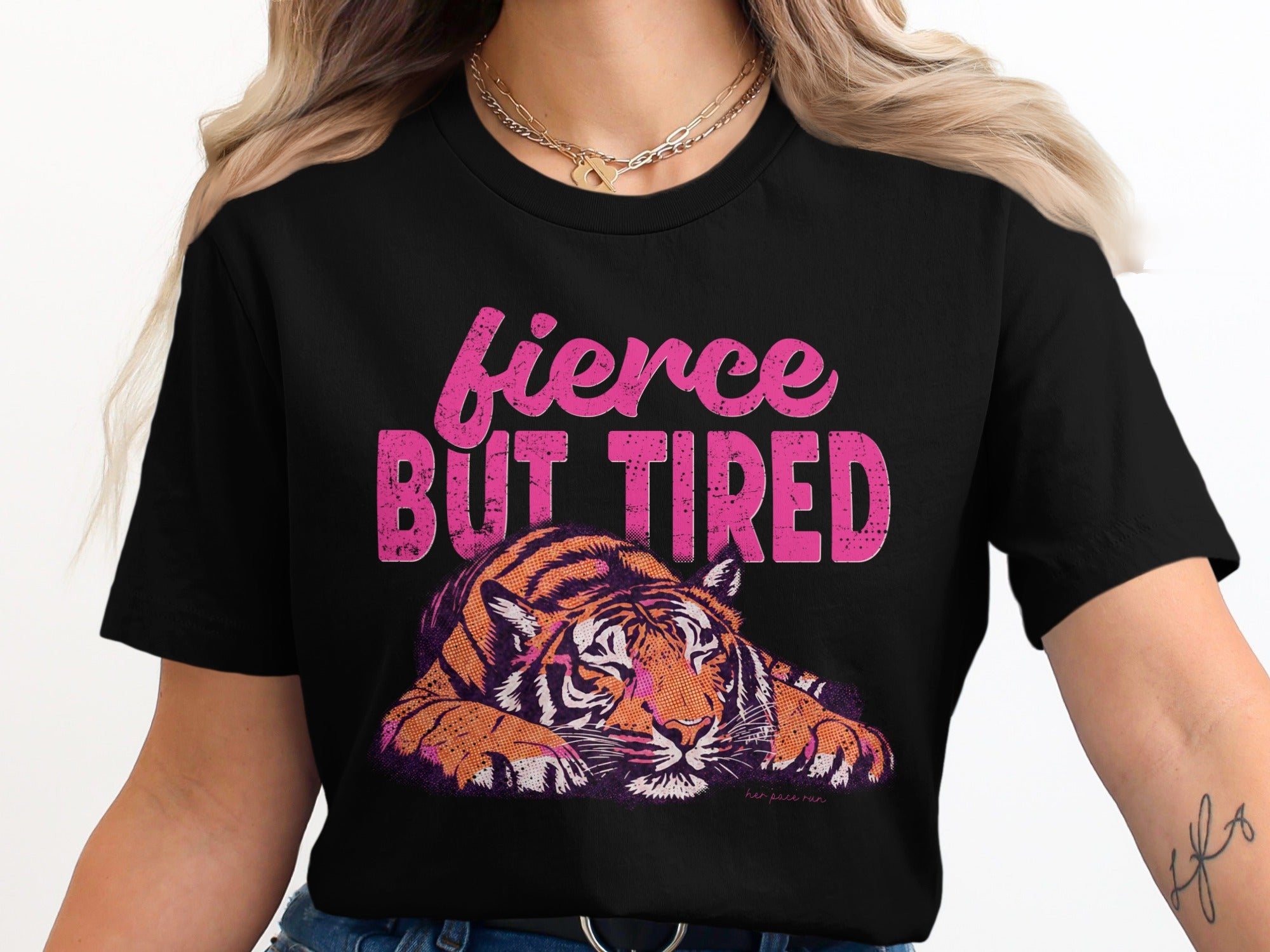 Black t-shirt with tiger illustration and text "fierce BUT tired".