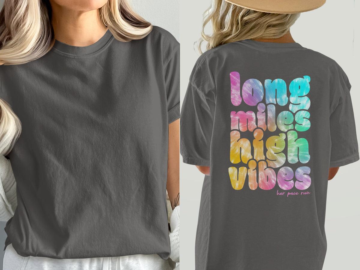 Dark gray t-shirt with colorful tie-dye text "long miles high vibes".