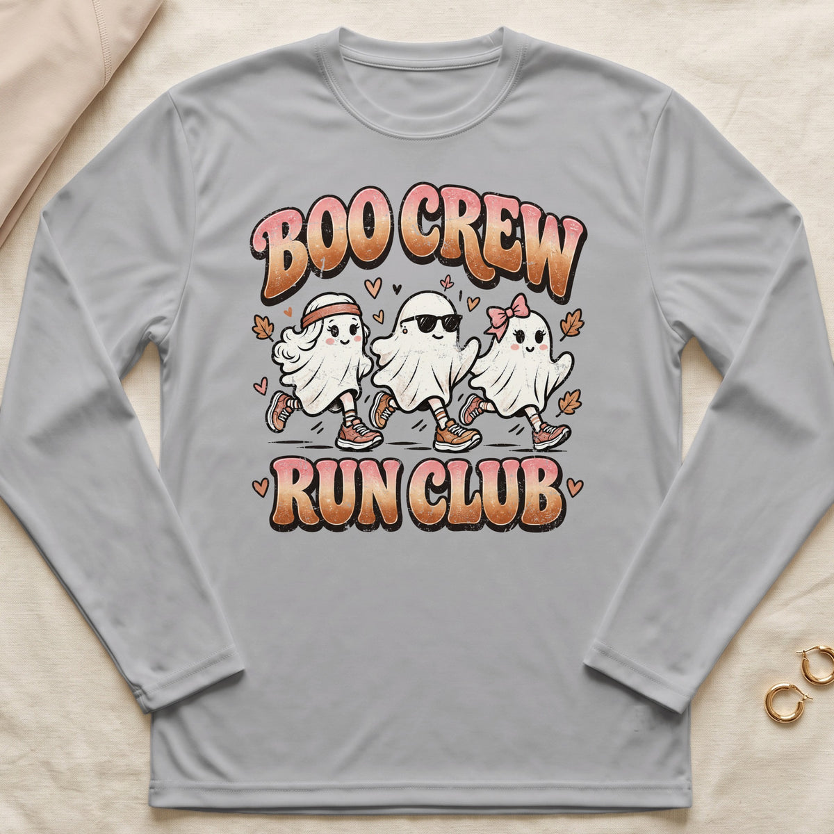 Three cartoon ghosts in running shoes, with text "Boo Crew Run Club".