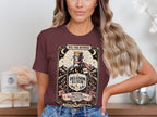 Maroon t-shirt with a tarot card design featuring "Delusion Elixir" and a marathon warning.
