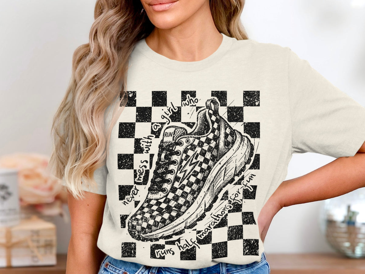 Graphic tee with a checkered shoe and the text "never mess with a girl who runs half marathons for fun".
