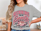 Gray t-shirt with text "RUNNING FOR MY Sanity BECAUSE I DON'T HAVE BAIL MONEY" and pink running shoes.