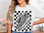 T-shirt graphic of a checkered running shoe with text about running.