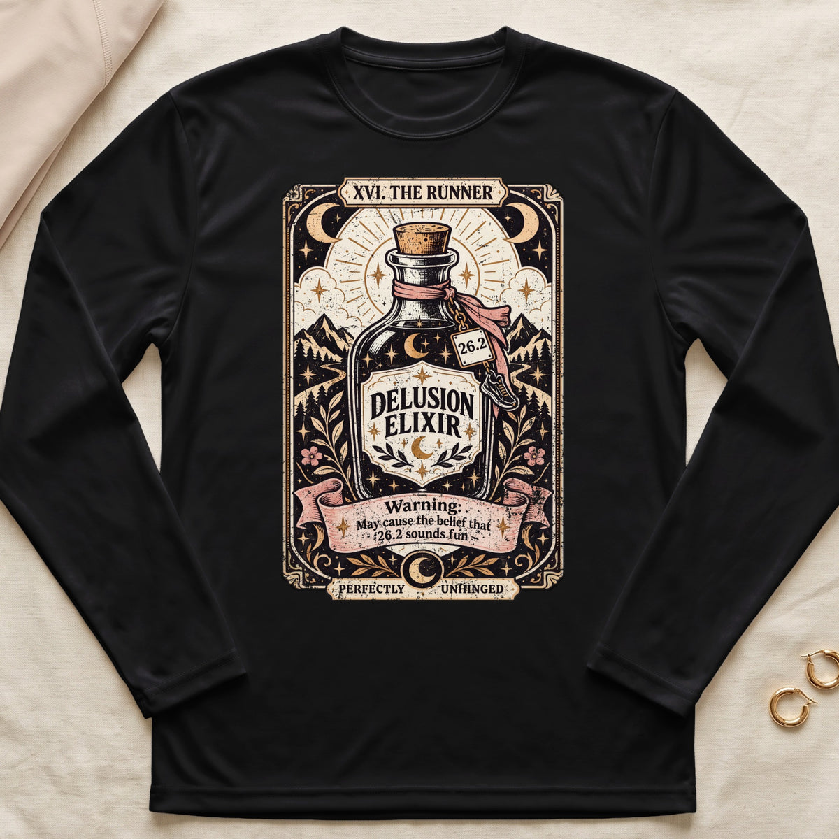 Black long-sleeve shirt with "Delusion Elixir" and marathon-themed art.