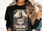 "Delusion Elixir" sweatshirt with "XVI. The Runner" and a warning about 26.2.