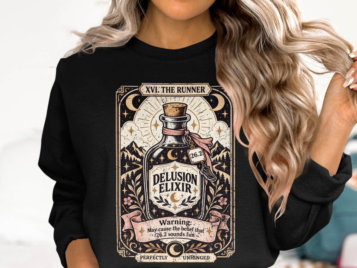 "Delusion Elixir" sweatshirt with "XVI. The Runner" and a warning about 26.2.