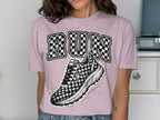 Pink t-shirt with "RUN" text and a checkered running shoe graphic.