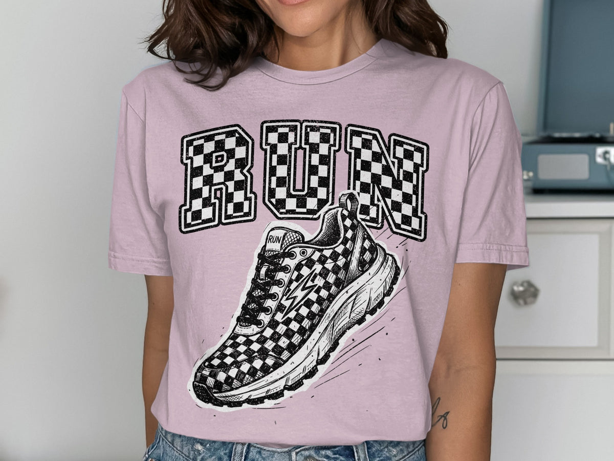 Pink t-shirt with "RUN" text and a checkered running shoe graphic.