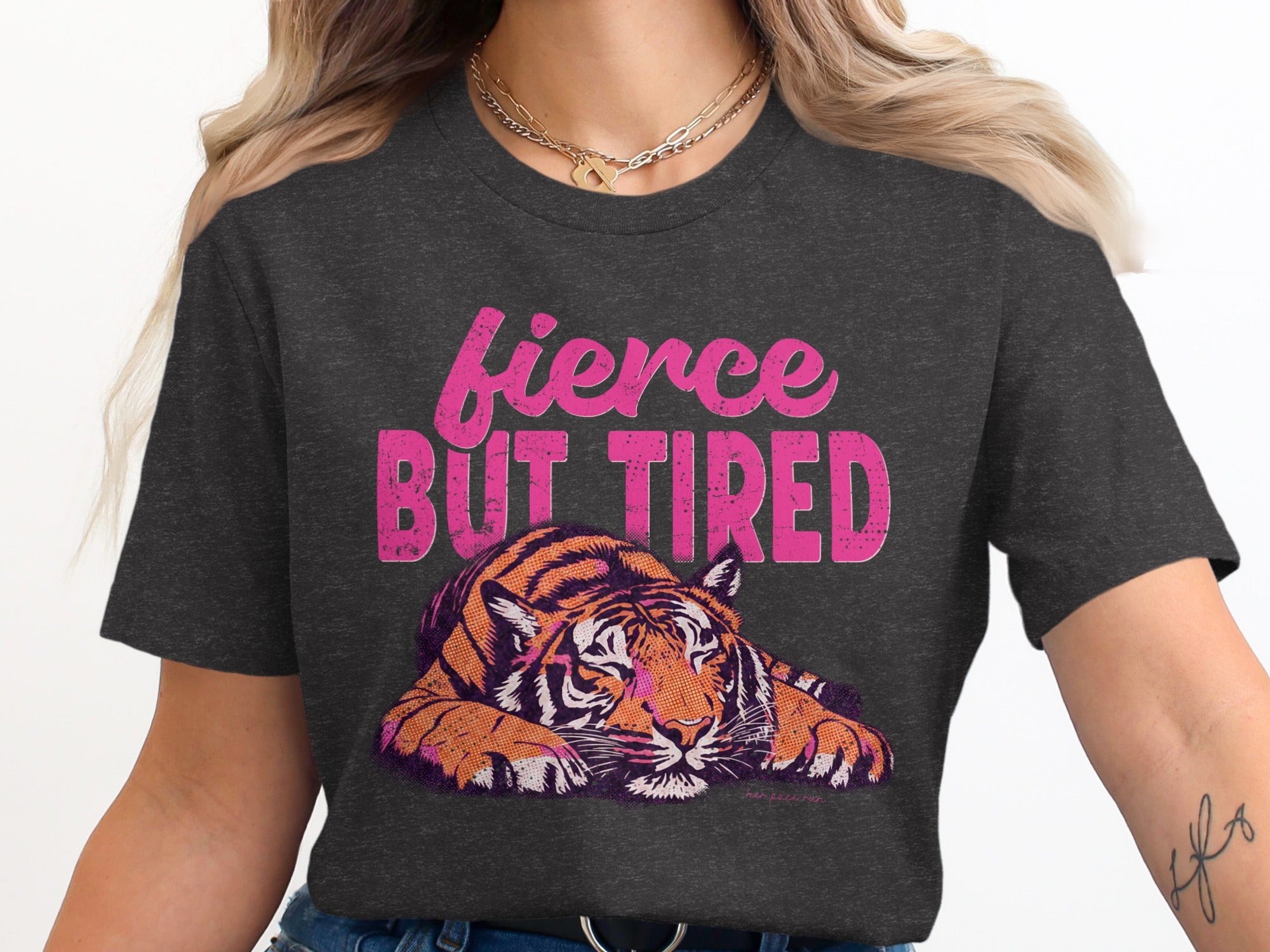 Dark grey t-shirt graphic with a tiger and "fierce BUT TIRED" text.