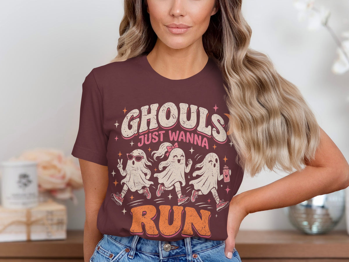 T-shirt graphic with three cartoon ghosts running and text that reads "GHOULS JUST WANNA RUN."