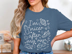 Blue t-shirt with white text and graphics reading "I'm nicer after my run"