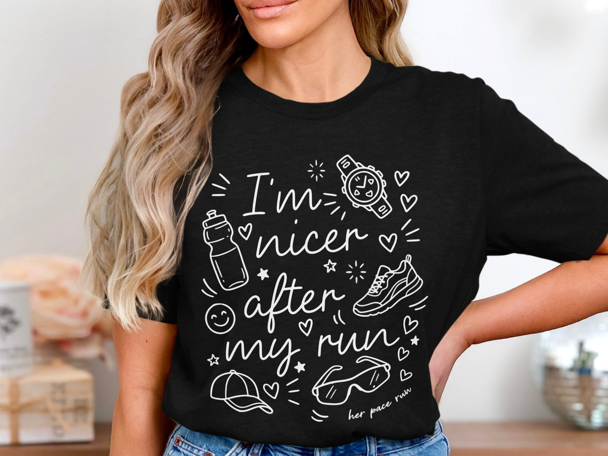Black t-shirt with white text and graphics saying "I'm nicer after my run".