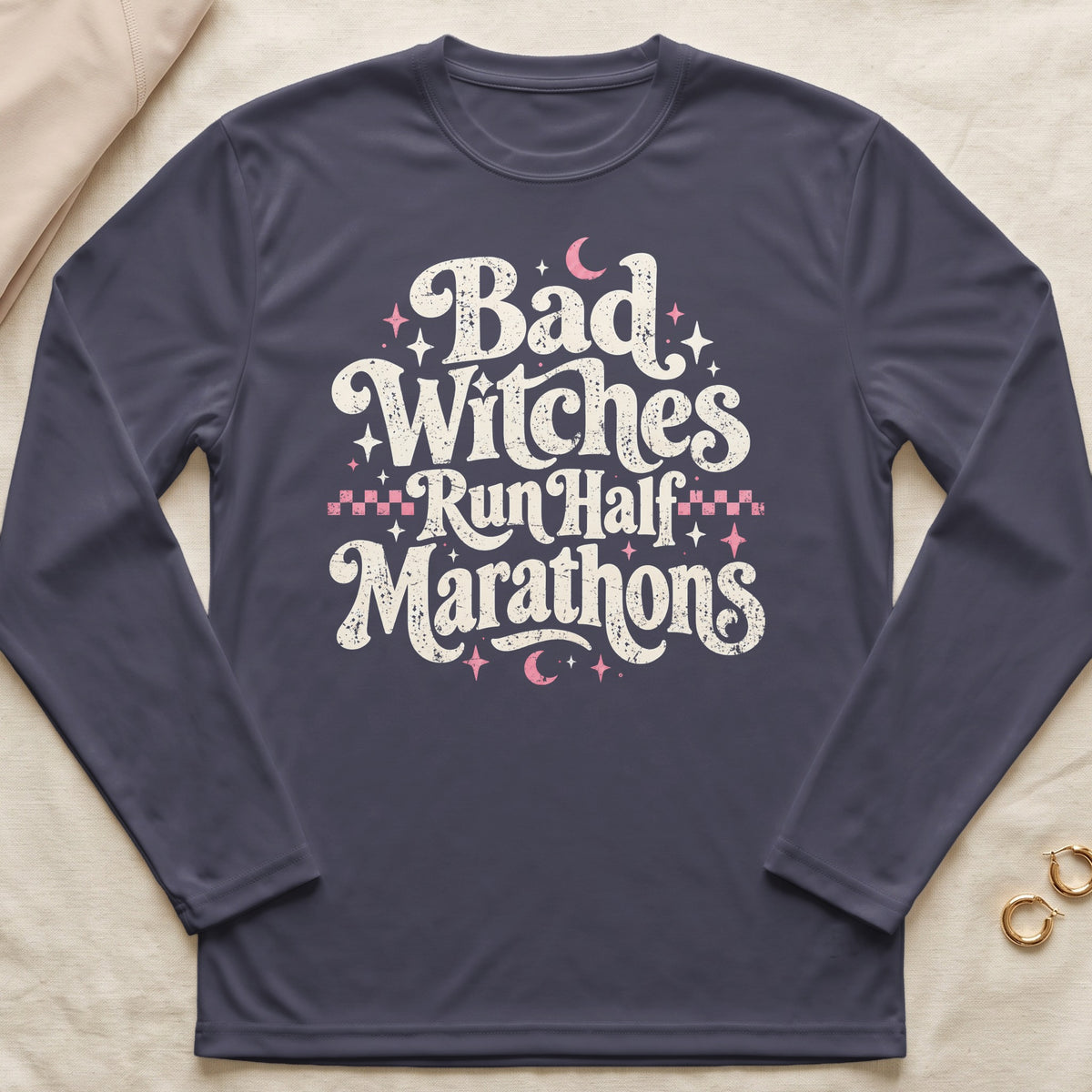 Dark grey long sleeve shirt with "Bad Witches Run Half Marathons" graphic.