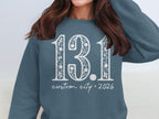 "13.1" with floral accents and "custom city * 2026" text.