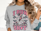 Grey sweatshirt with pink graphic of a skeleton runner and text "I RUN So I Don't Lose My SH*T".