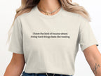 Cream t-shirt with text "i have the kind of trauma where doing hard things feels like healing".