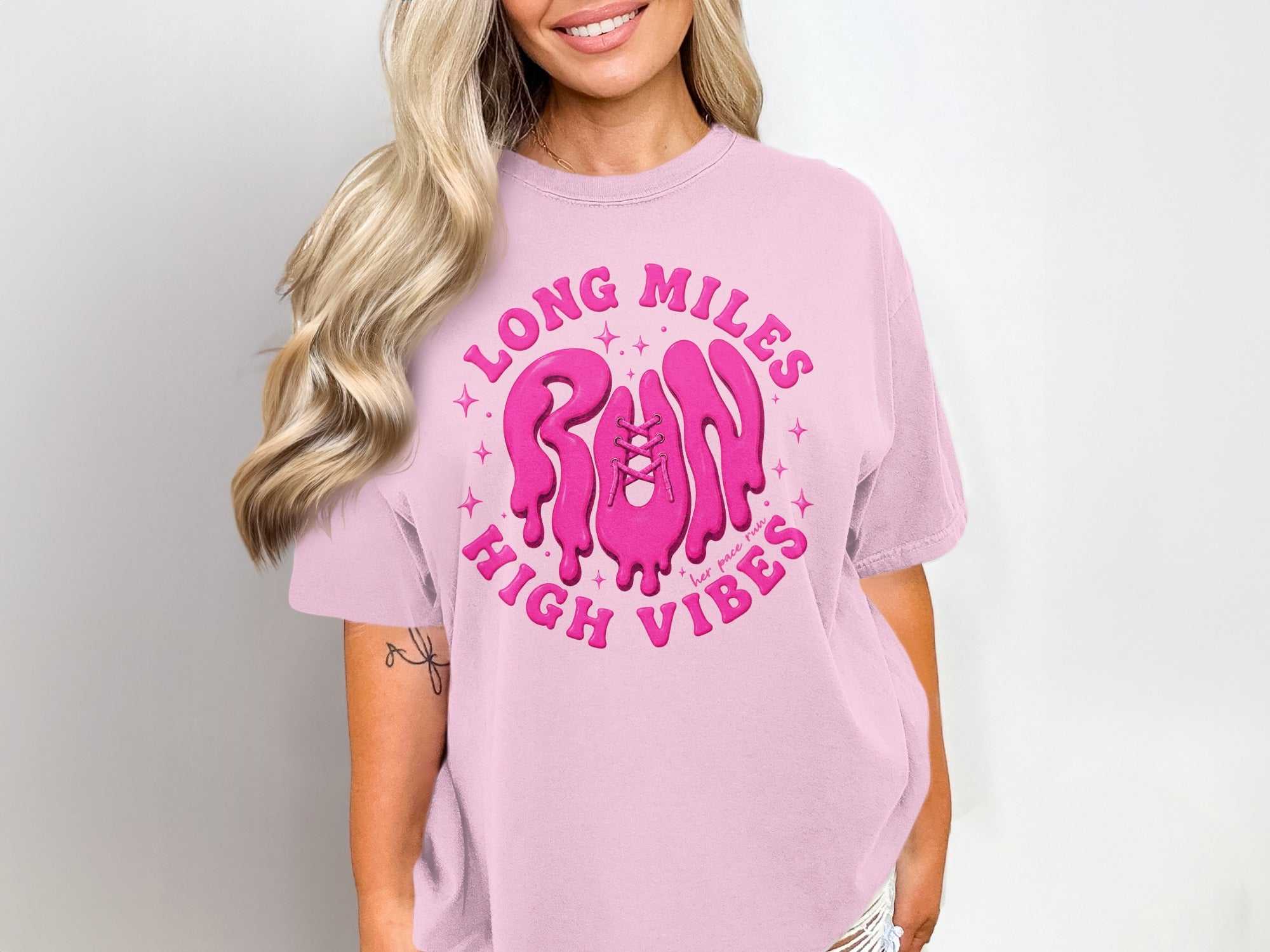 Pink t-shirt with "Long Miles Run High Vibes" graphic featuring a dripping shoe.